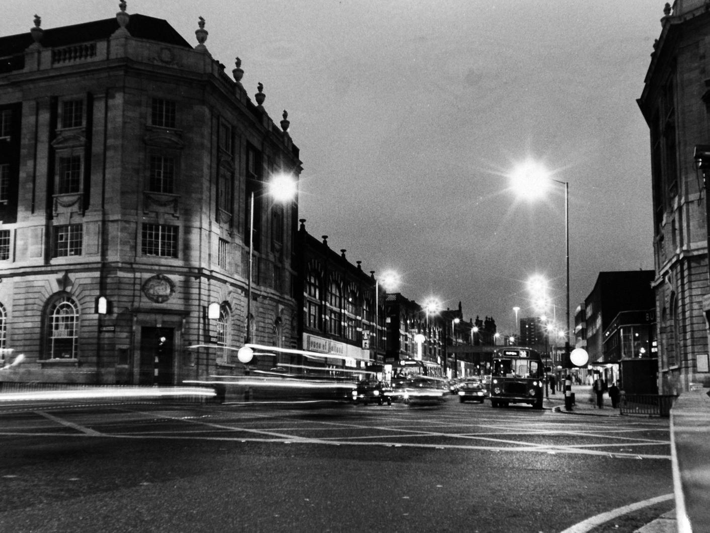A night scene of Vicar Lane from its junction with The Headrow. Pictured in September 1973.