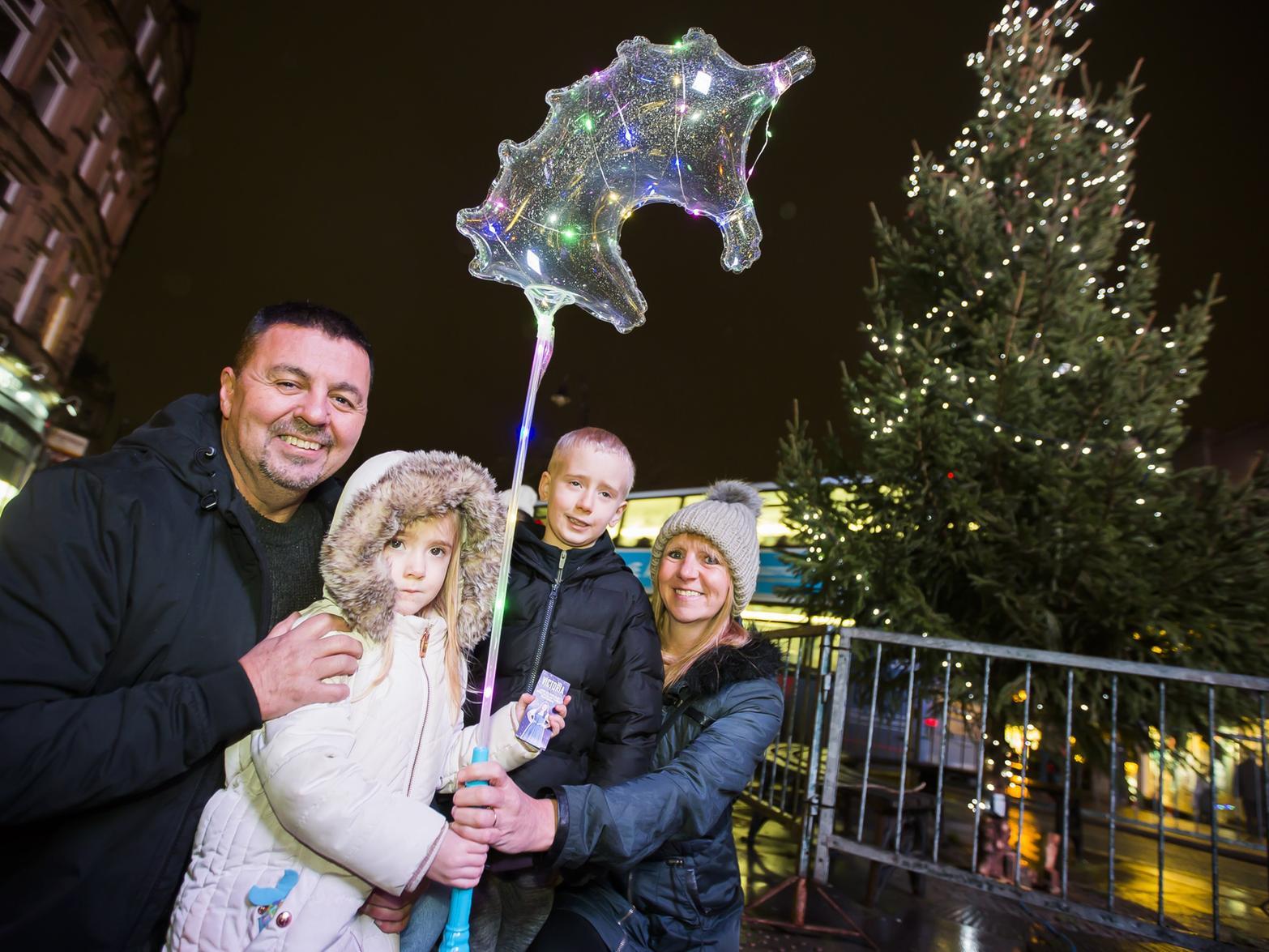 Halifax Christmas lights switch-on. From the left, Keith Waterworth, Violet McNeish, four, Riley McNeish, seven, and Sally Smith.