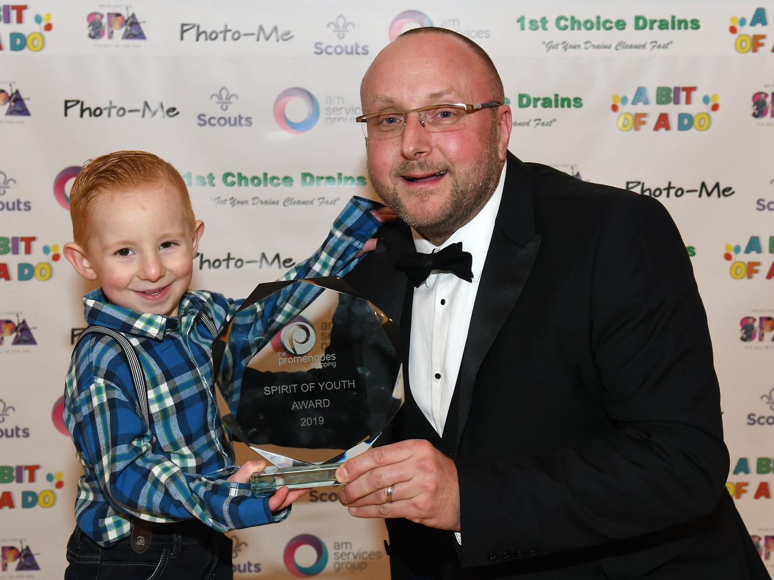 Carl Brown, Promenades Centre Manager, presents the Spirit of Youth Award to Ronnie Kemp-Duke