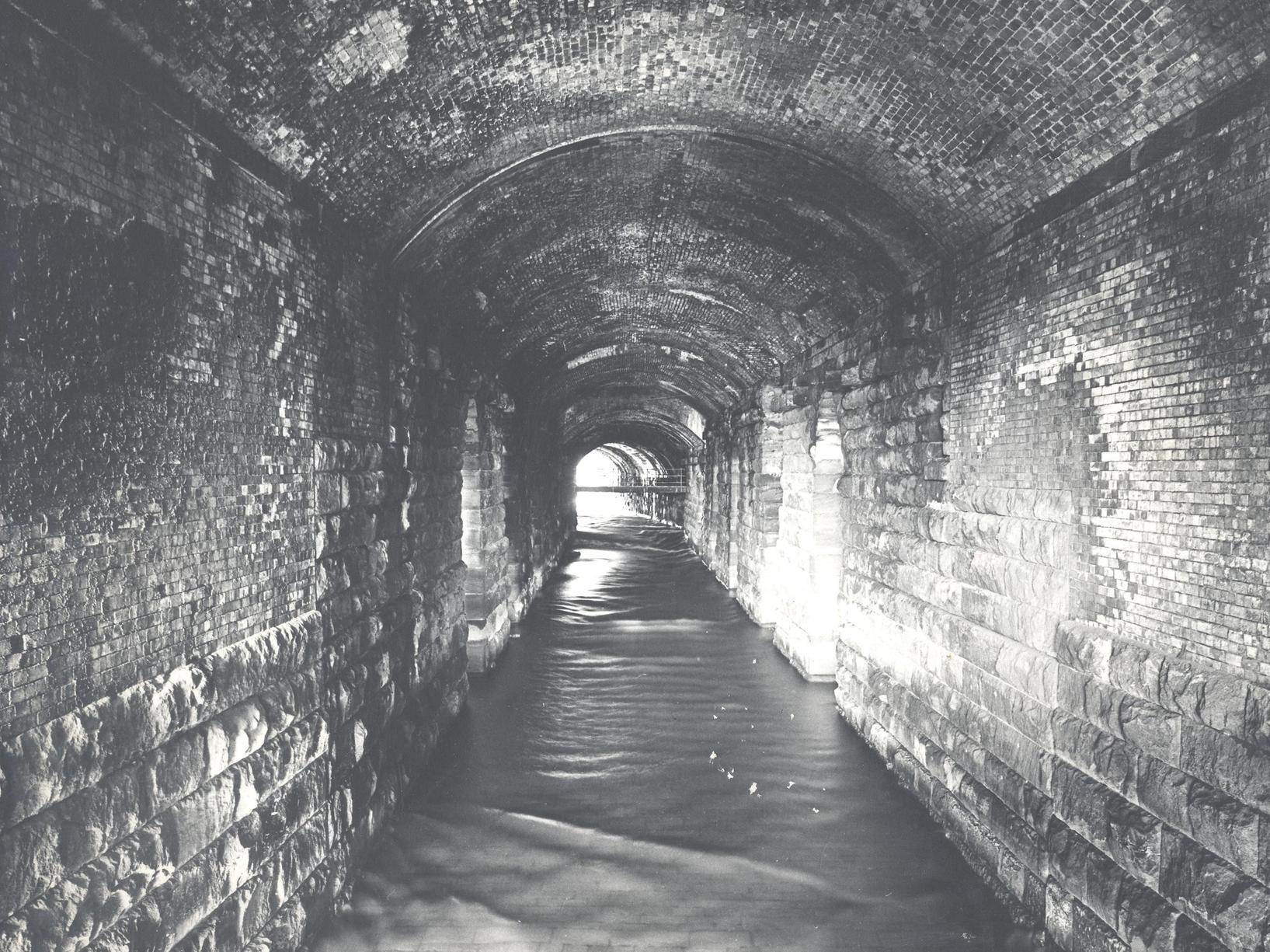 The River Aire running under the Dark Arches.