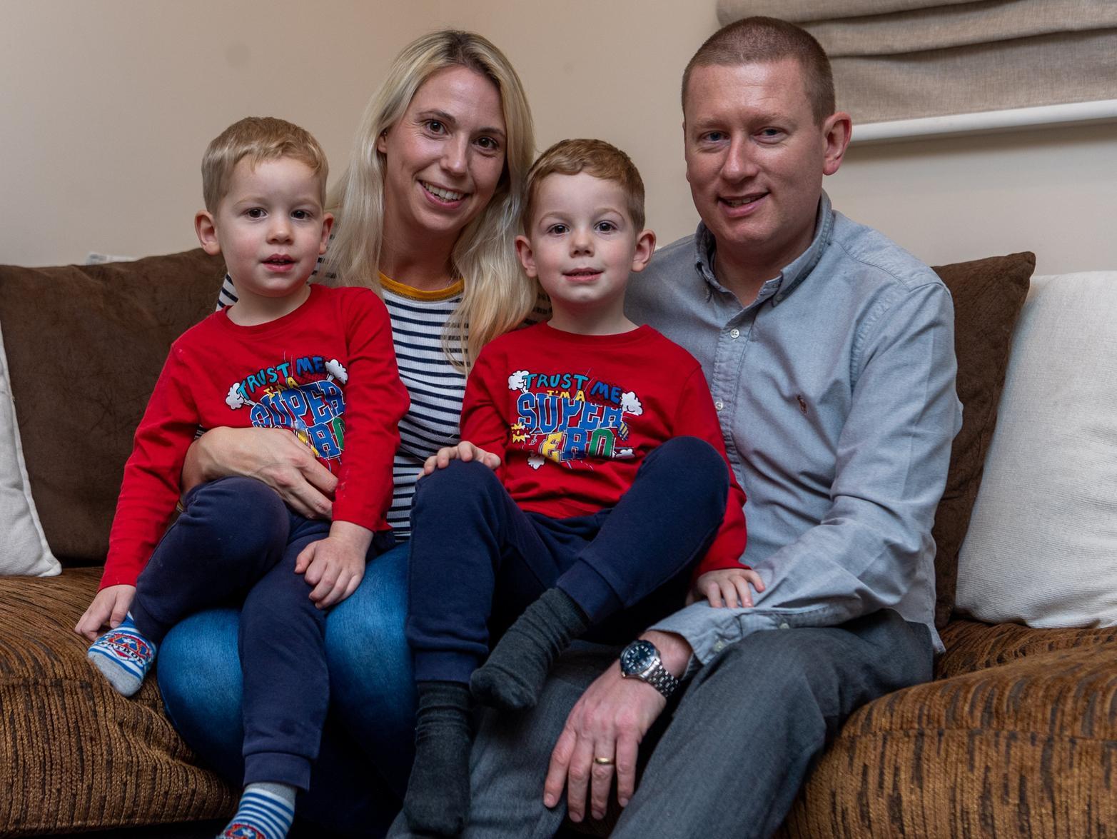 Clare and Carl Chapman are pictured with sons Finley (right) and Austin.
Photo: James Hardisty