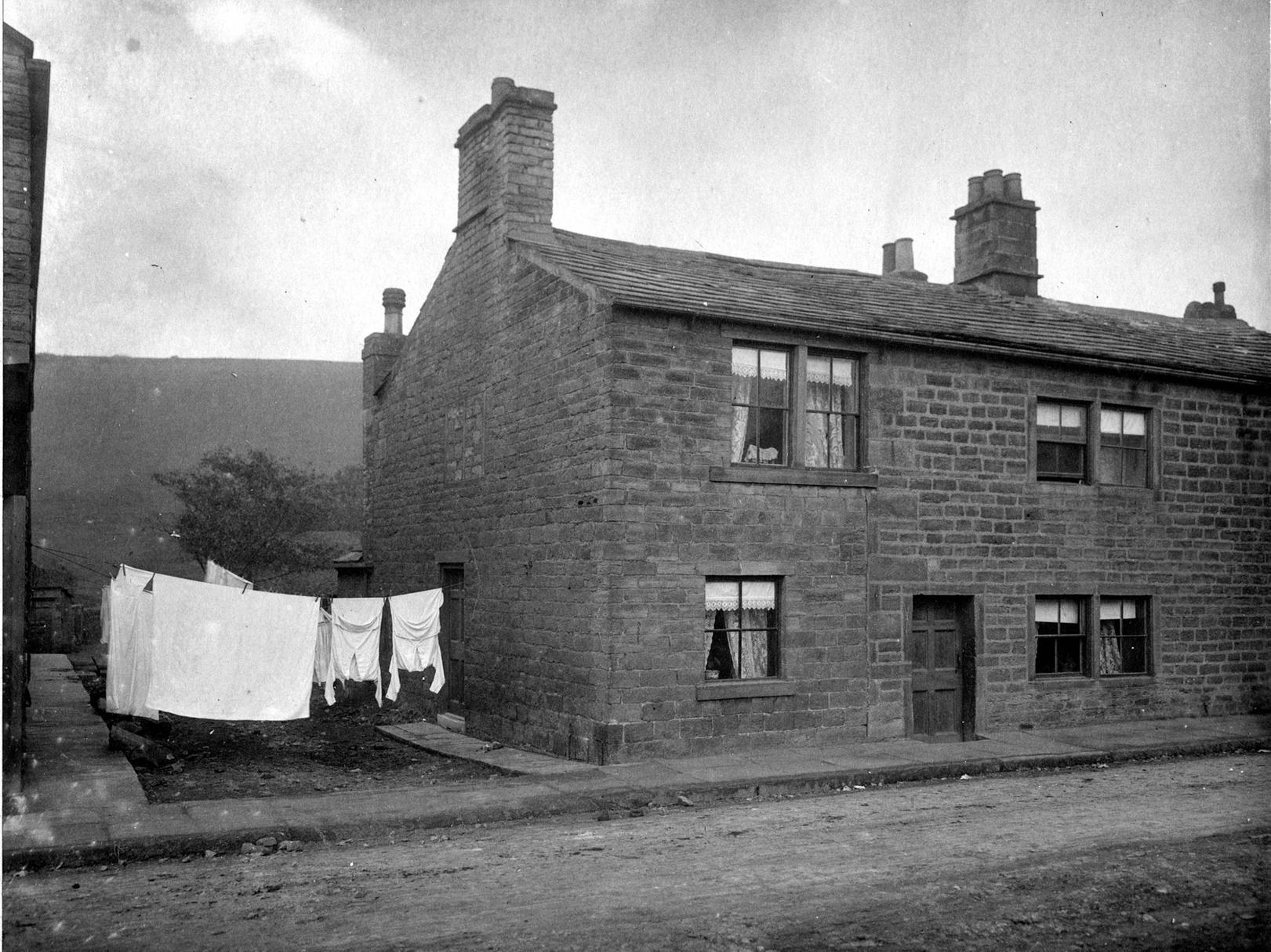Stone built, two storey cottages on Bagley Lane. The photo was taken as part of an assessment of the area prior to the work on sewers which was about to commence.