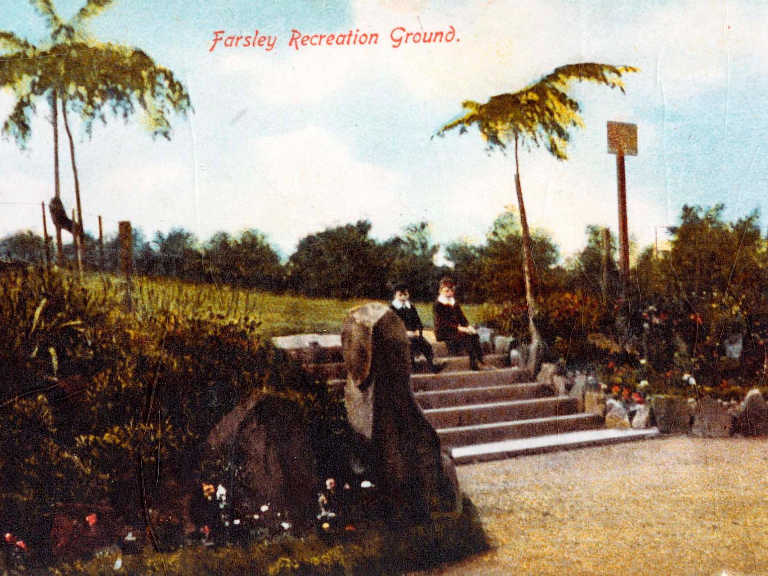 Colour-tinted postcard showing the south-eastern entrance to Farsley Recreation Ground off Calverley Lane. Two children are sitting on the steps.