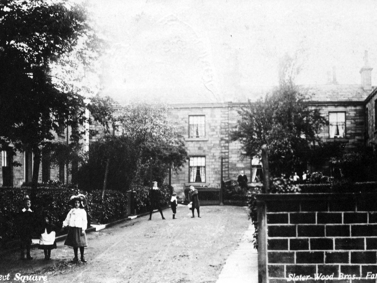 Prospect Square off New Street, taken around the late 19th or early 20th century. Children are playing in the street.