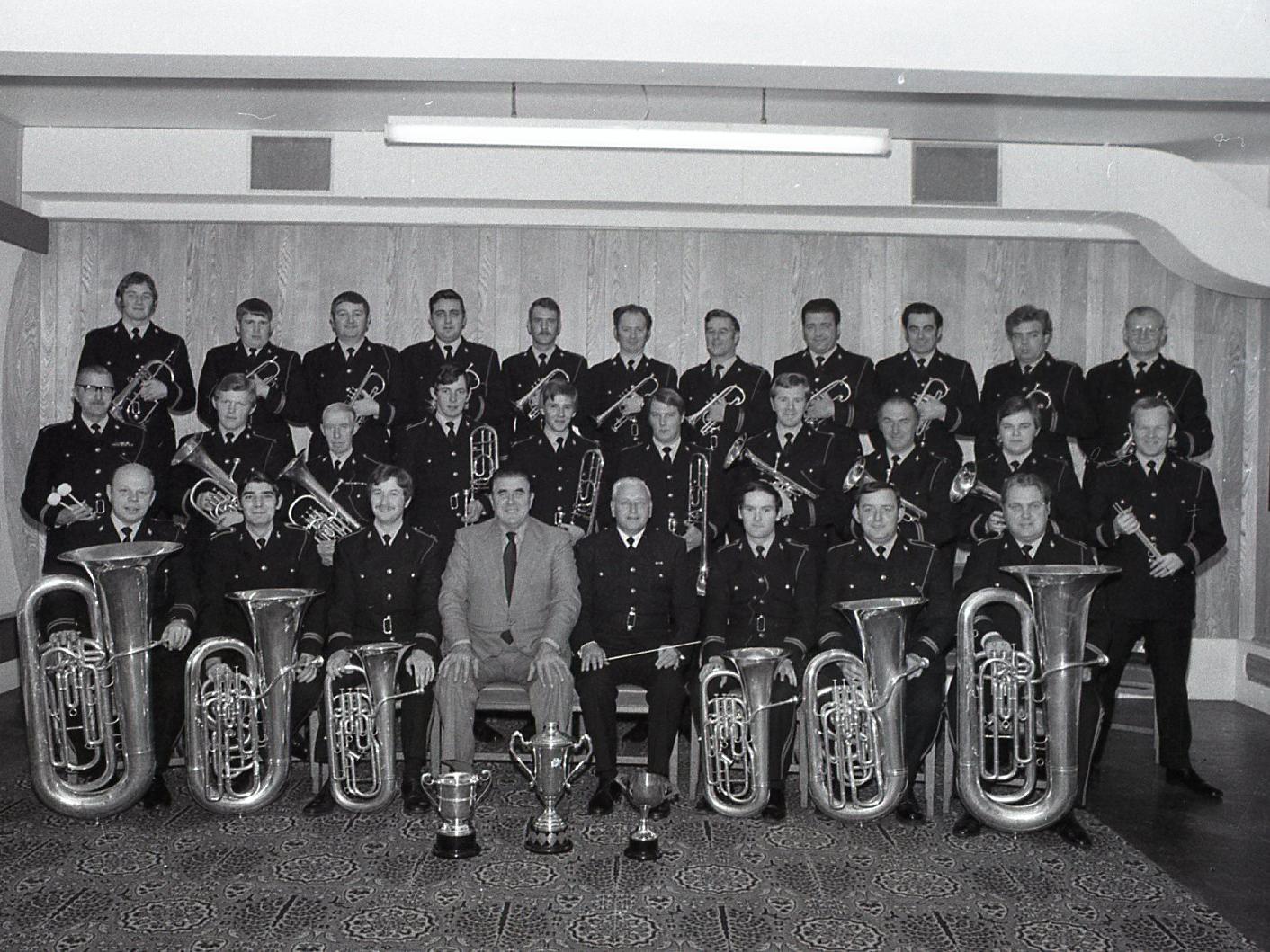 Lancashire Constabulary Brass Band players are blowing their own trumpet - for they have just won 500 and a trophy in a national competition. The band, under the direction of Bandmaster Mr William Hill, beat eight other bands in the Pontins Championship Final Cup contest at the Prestatyn Holiday Village, North Wales