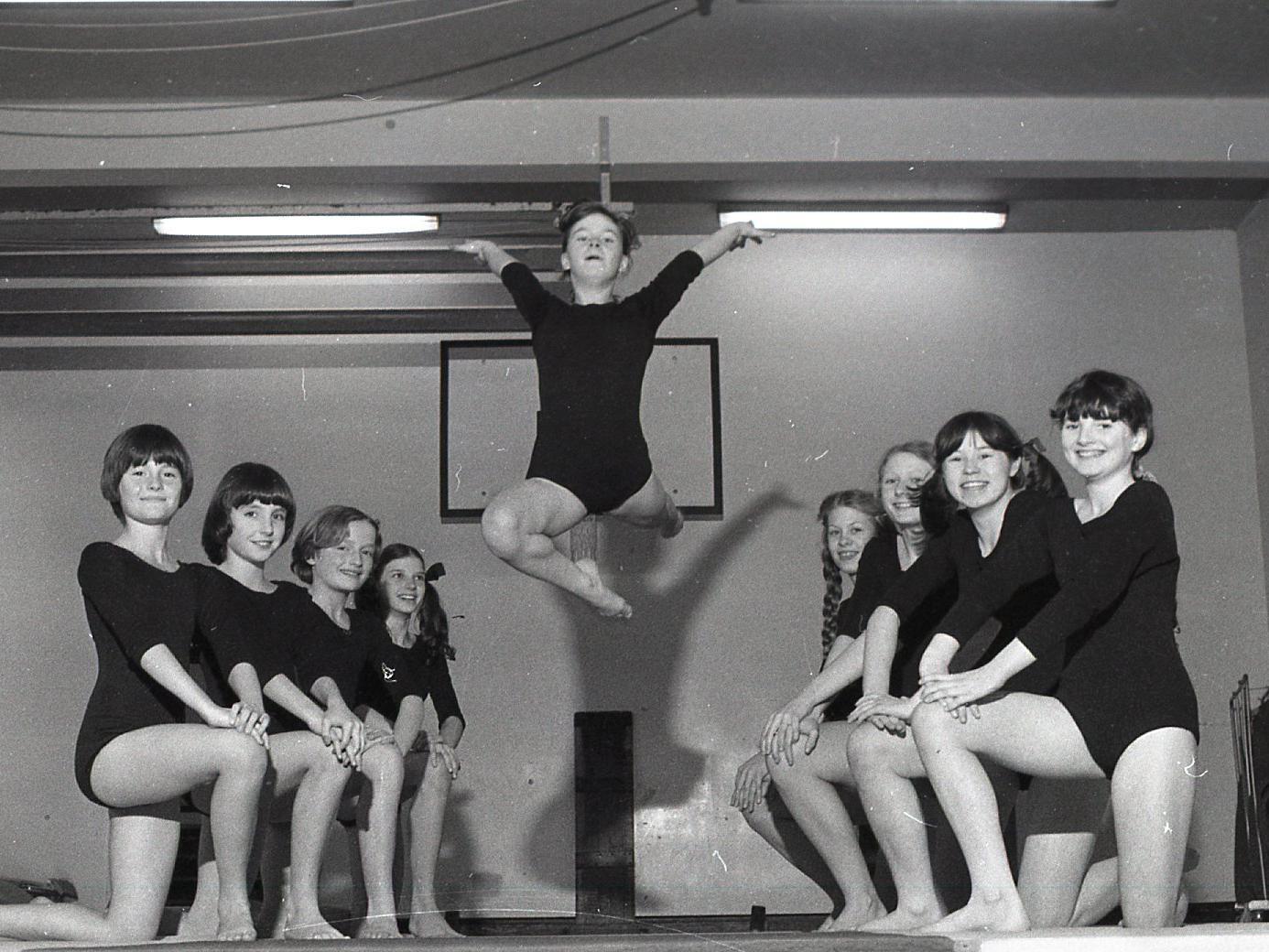 The Winckley Square Convent gymnastics teams. Left, the junior team (left to right): Alison Scott, Sharon Murphy, Nicola Rigby, Alison Bevan. Centre is junior team member Felicity Carroll. Right, the senior team (left to right): Annette Davis, Bernadette Booth, Debra Whalley and Pamela Creeley