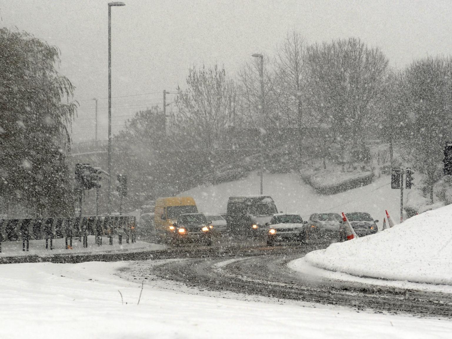 A snow blizzard made driving hazardous for commuters, pictured here at Armley Gyratory.