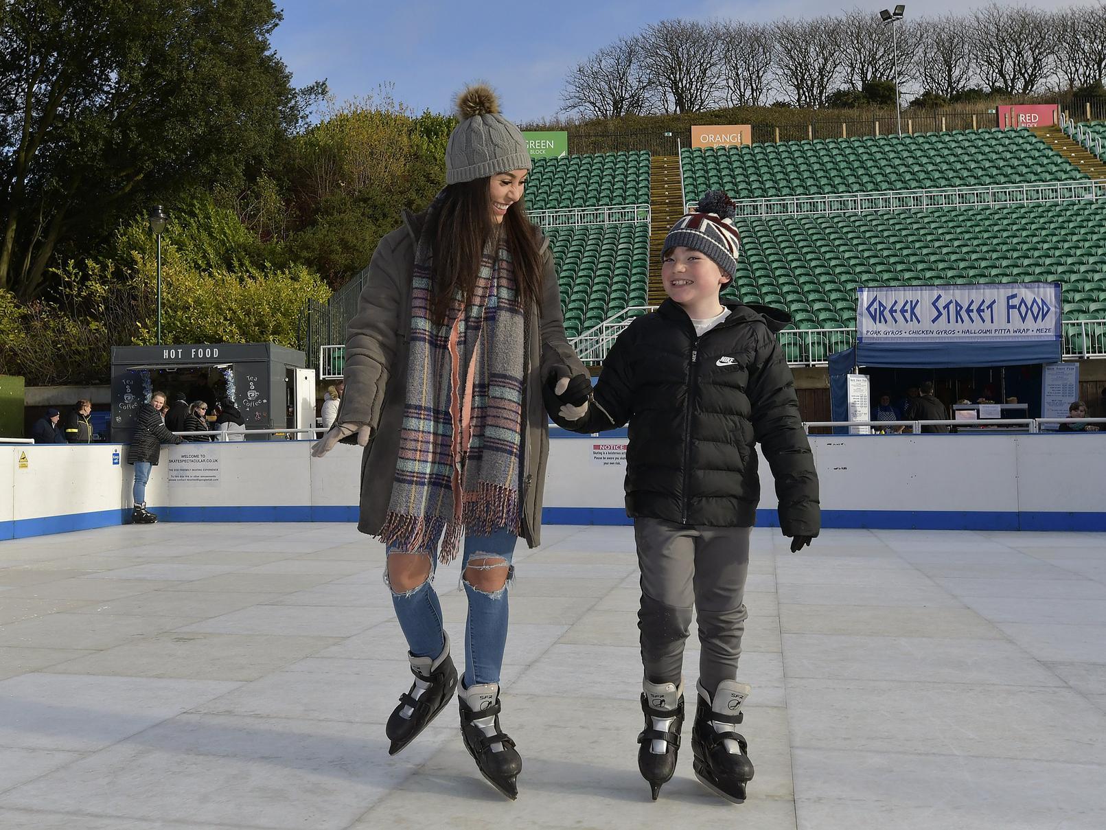 Danielle and William Chapman enjoy an ice rink adventure.
