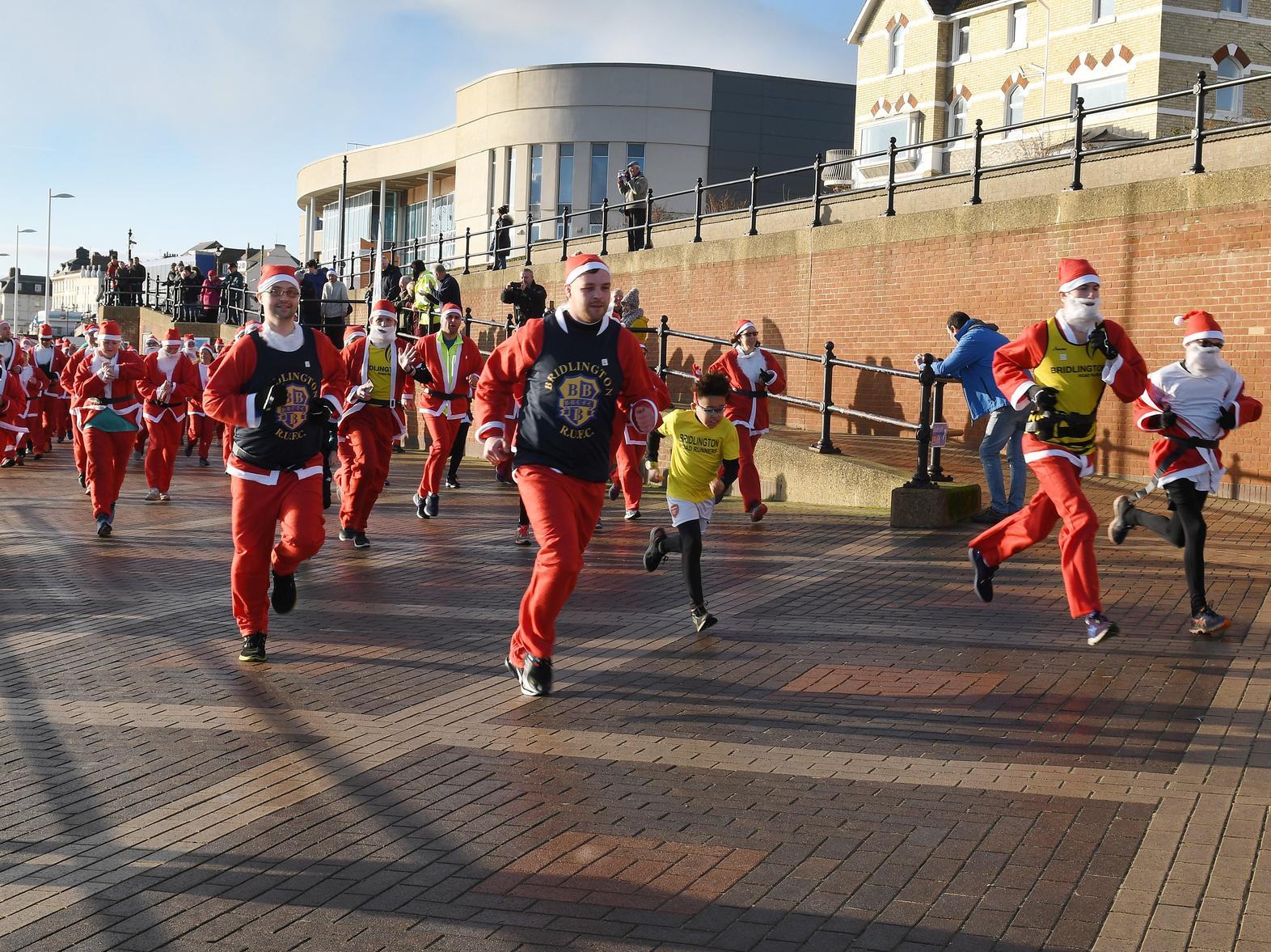 Runners set out along the seafront.