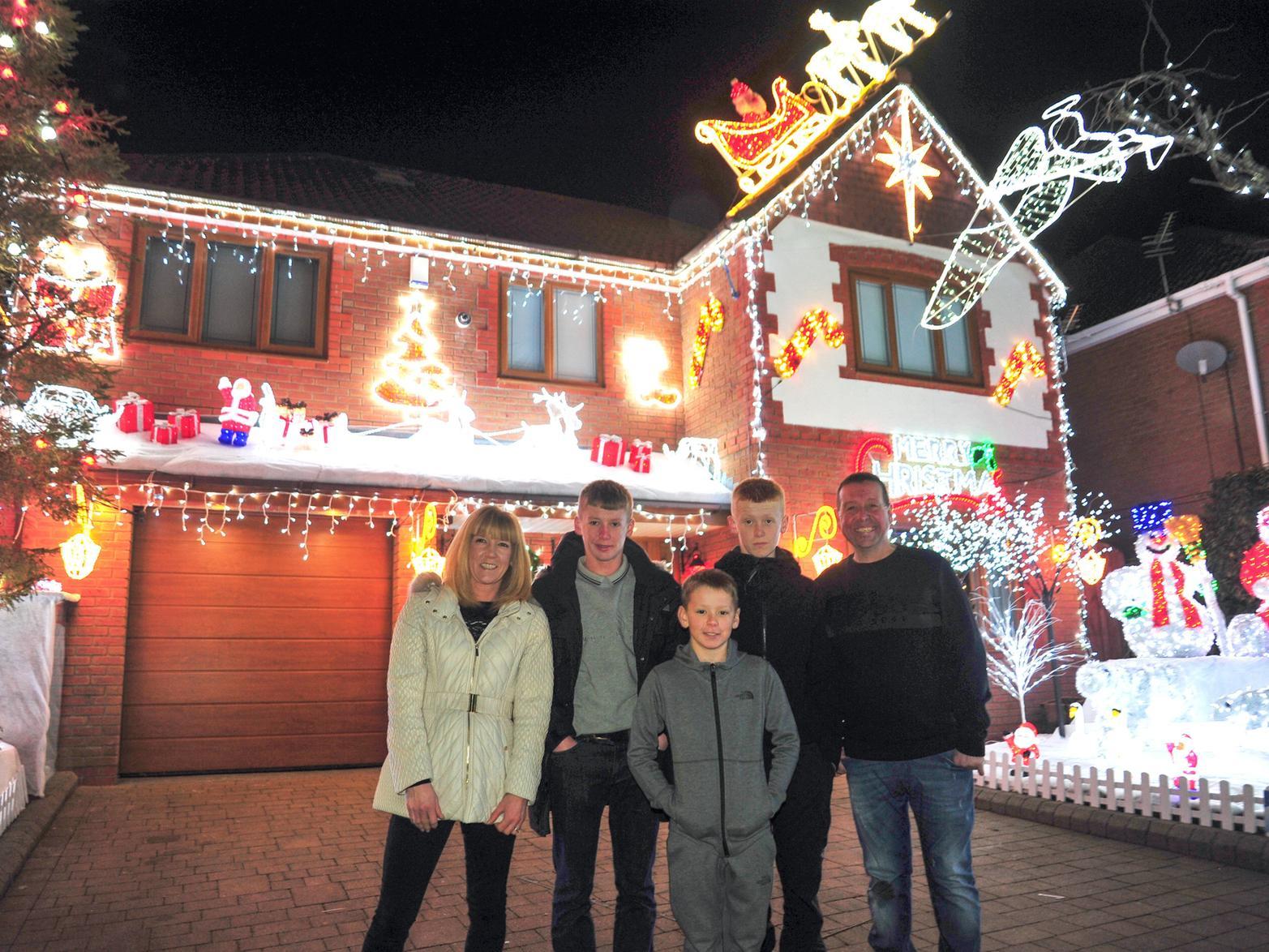 Nicola, Sam, 14, Isaac, 10, Joe, 13 and Mark Tipping at their family Christmas Lights Switch On in Cottam
