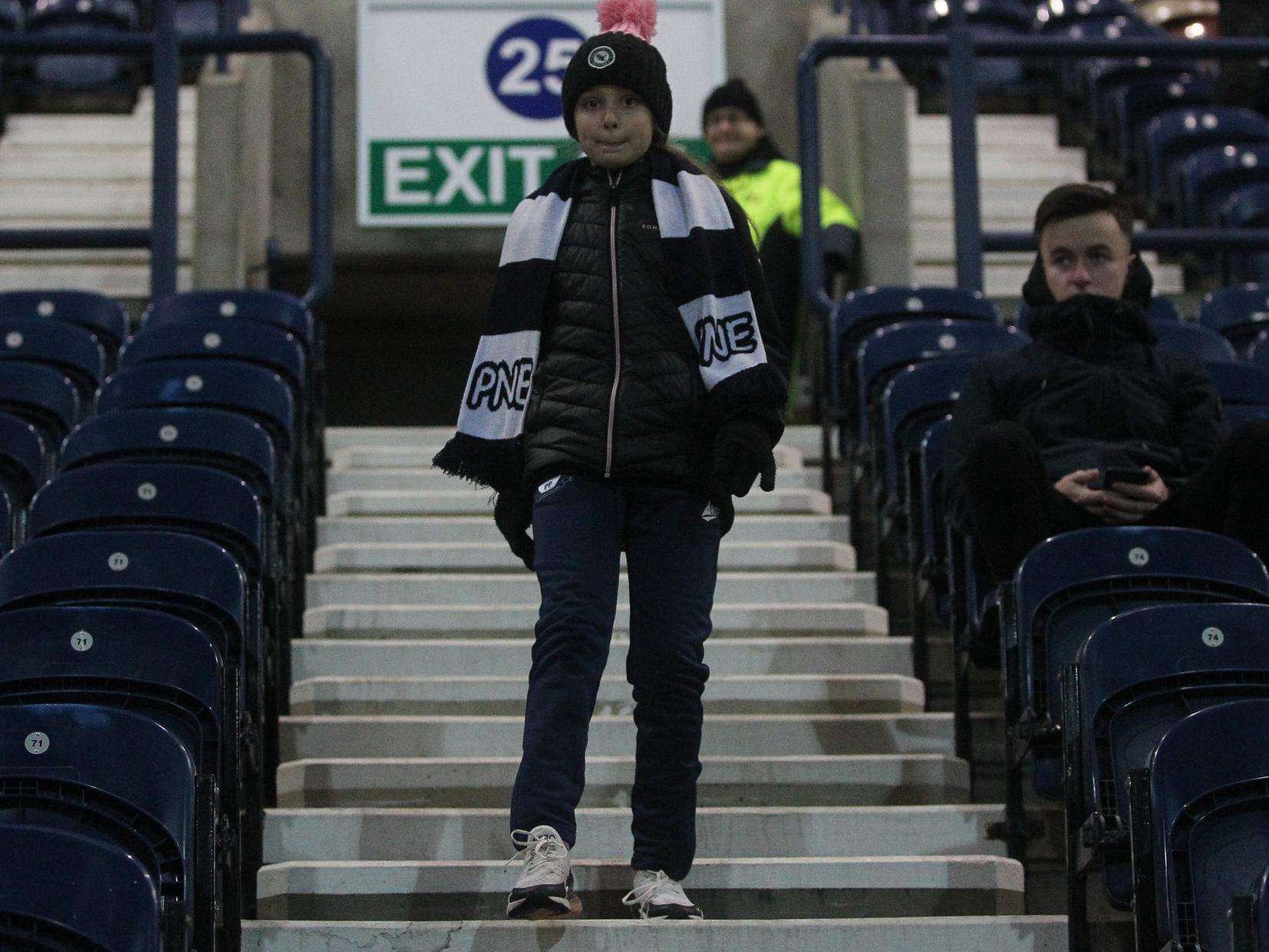 A young fan makes a familiar walk down the steps of the Alan Kelly Town End.