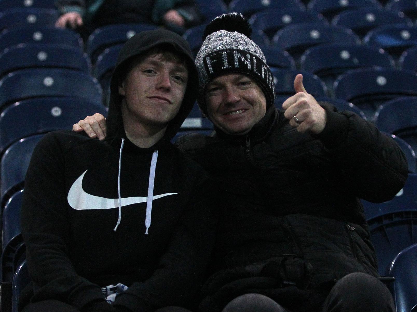 Two PNE fans pose for our photographer whilst they wait for kick off.