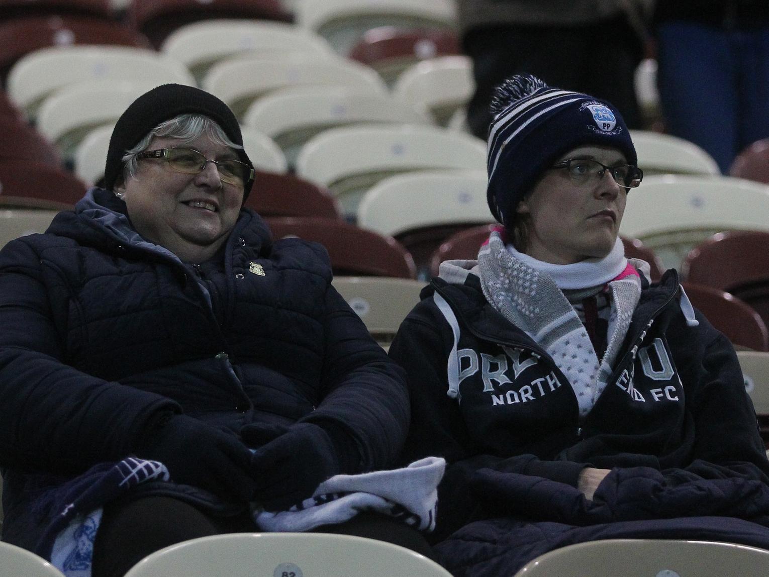 Plenty of PNE merchandise on show from these two fans ahead of kick off.