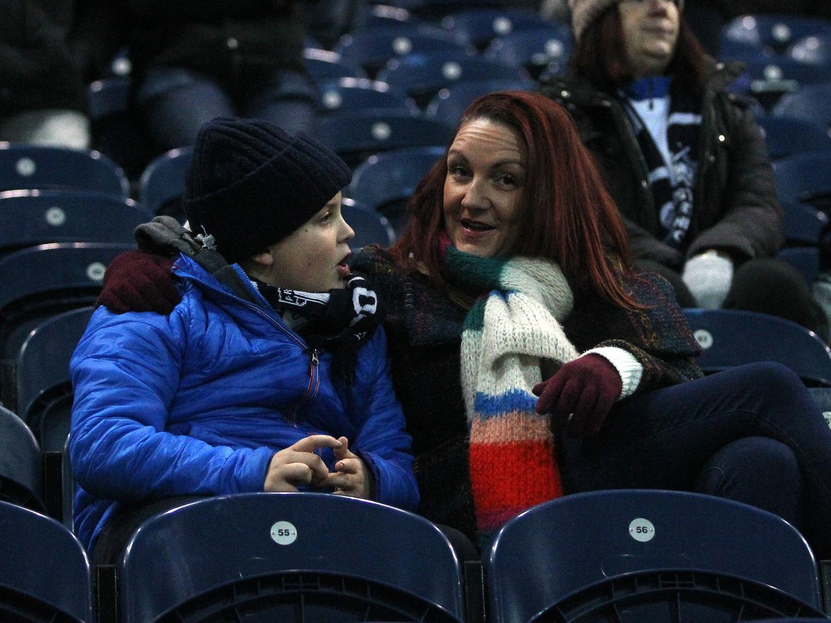 These two North End fans have a chat.