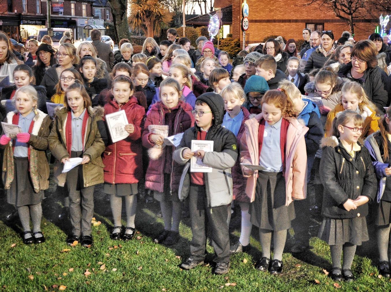 Carols were sung by school choirs