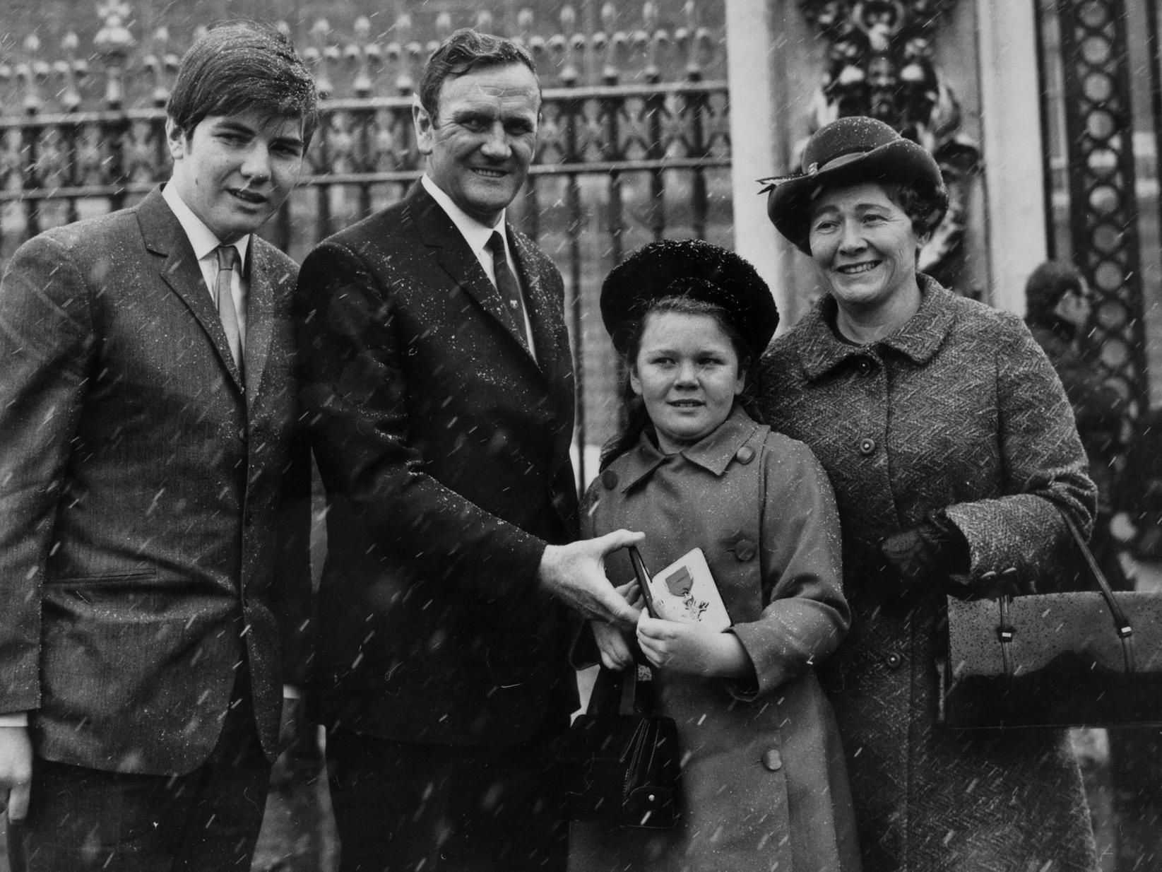 Don Revie with his son Don, daughter Kim and wife Elsie at Buckingham Palace after receiving the OBE