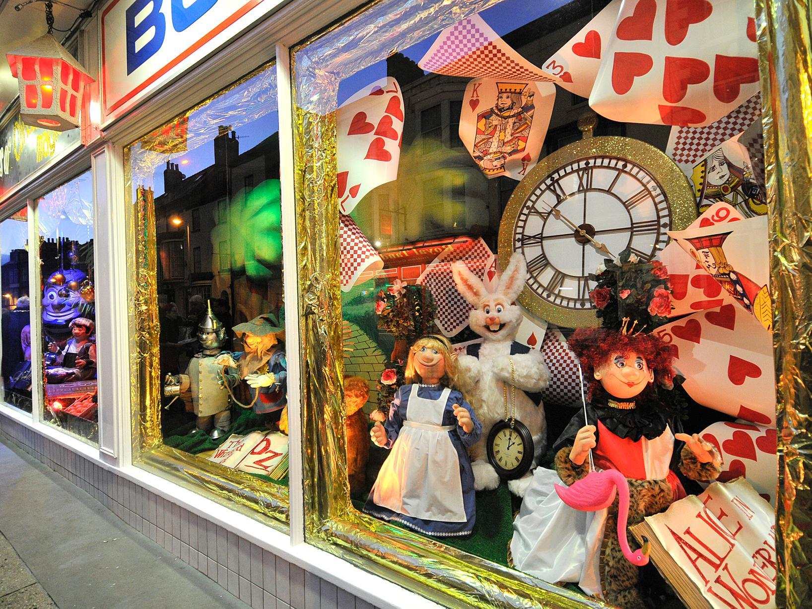 Characters from Alice in Wonderland and the Wizard of Oz filled the windows in 2016.