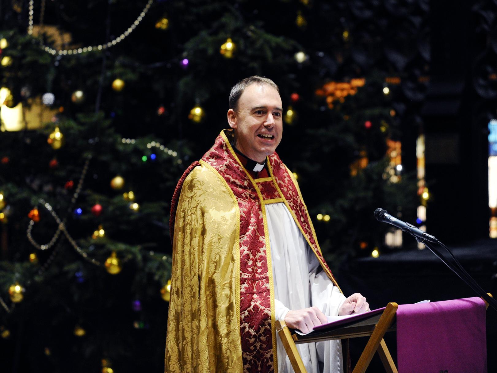 The Canon of Leeds, Sam Corley leads last year's Christmas service at Leeds Minster.