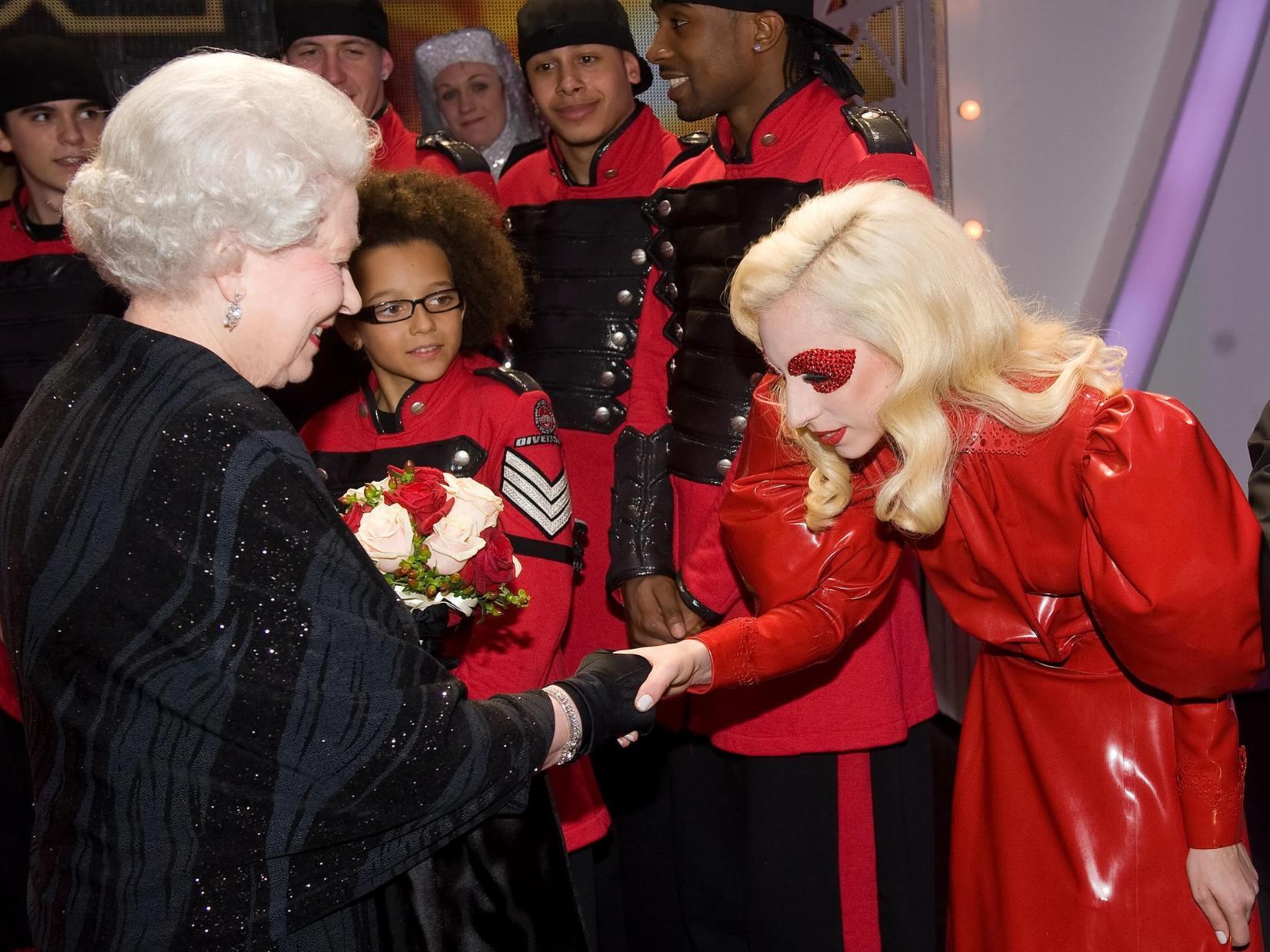 Lady GaGa was one of the big stars who took part in the show. Here she is pictured meeting the Queen.