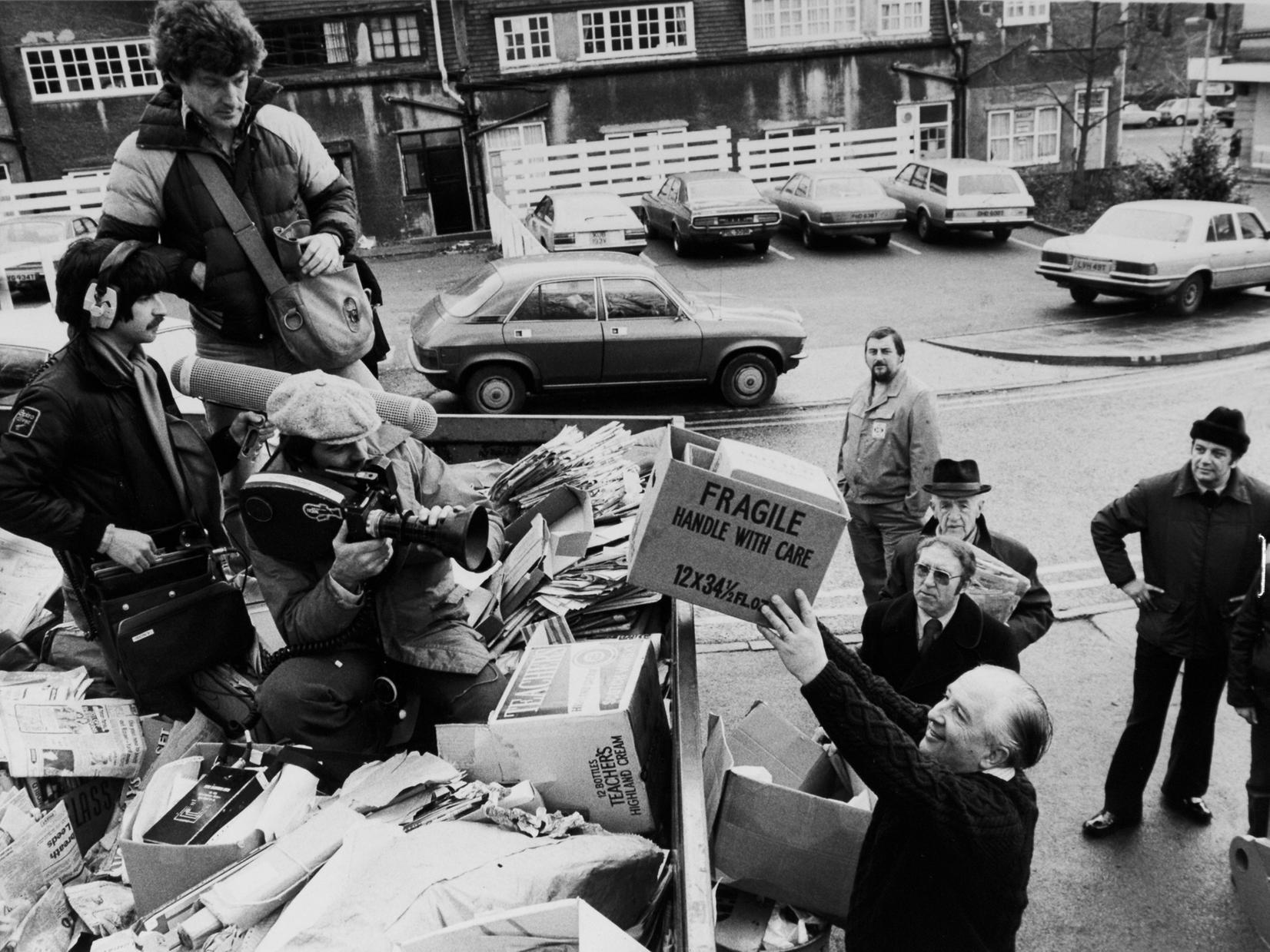 A BBC film crew clambered into a skip piled high with waste paper to the amazement of shoppers at Safeways in Oakwood. The crew were filming the monthly waste paper collection in the car park for a BBC Horizon documentary.
