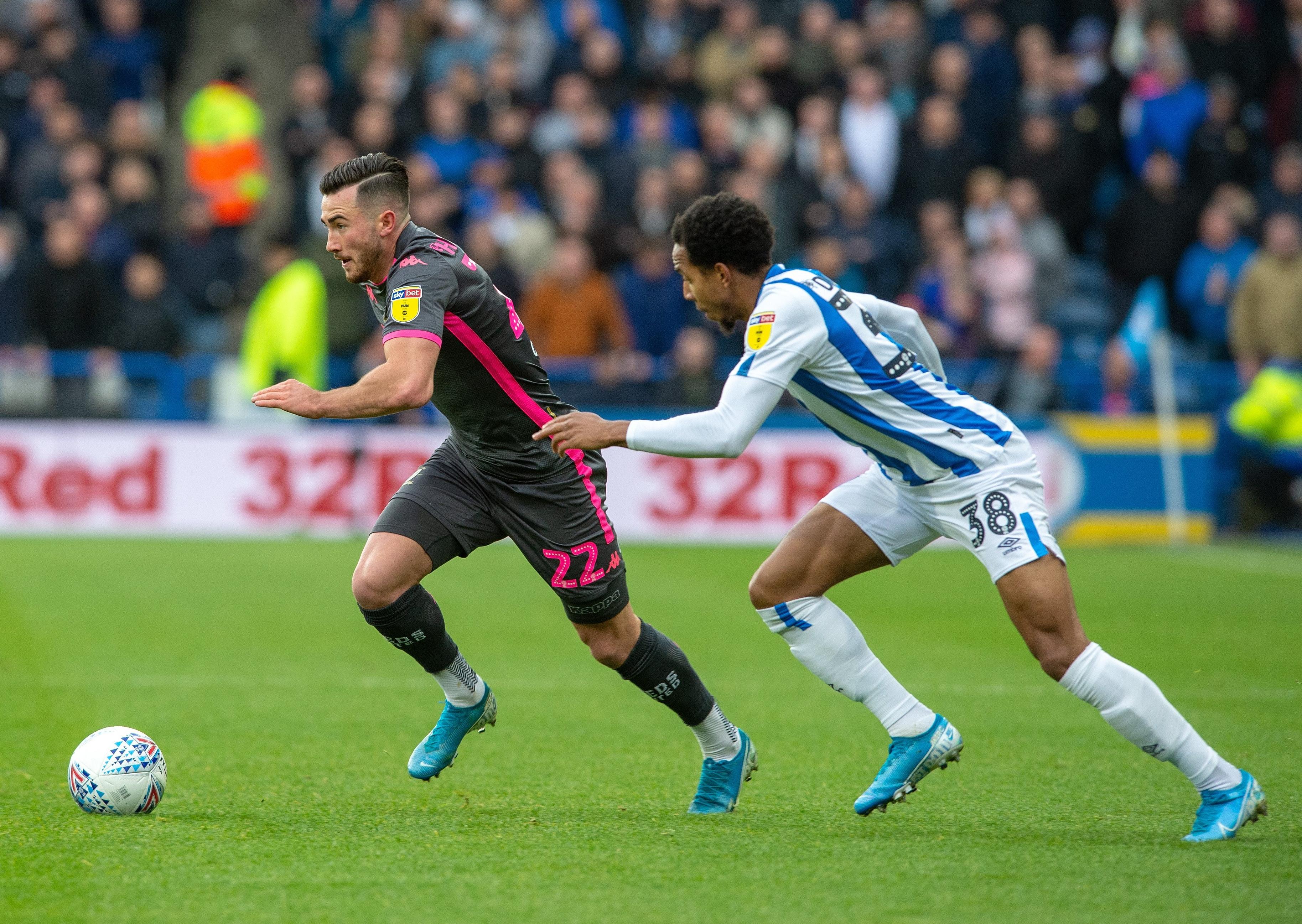 Eye-catcher, Jack Harrison is chased by Huddersfield's Demeaco Duhaney. PIC: Bruce Rollinson/JPIMedia
