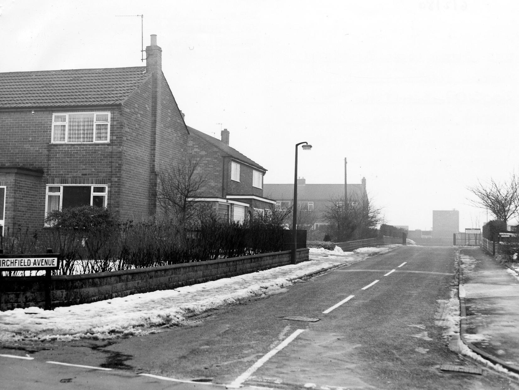 Street Lane at the junction with Birchfield Avenue.