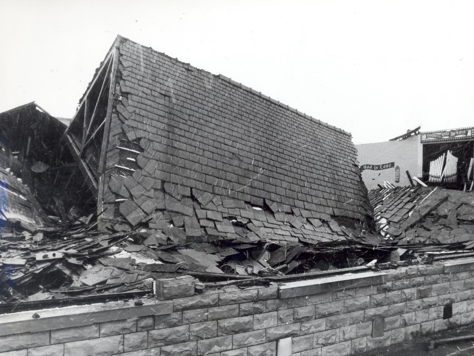 A woman told of her lucky escape when a freak gust of wind ripped the roof of the Church of the Nazarene on Albion Street, showering her in debris.