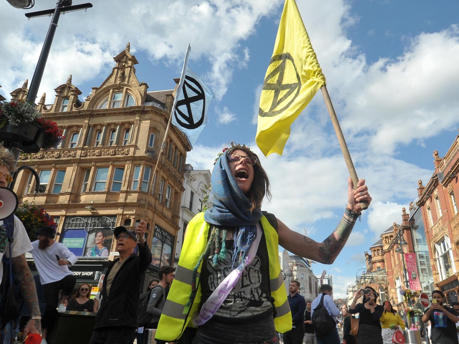 Protest group Extinction Rebellion stage a 'die-in' on Briggate in Leeds in July.