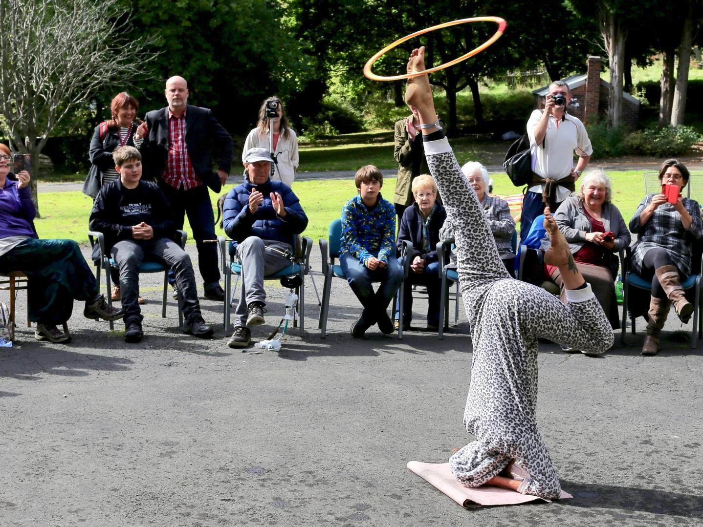 The most rotations of a hula hoop on one foot whilst in headstand position in one minute is 172, achieved by Ashlee Male (UK), in Sheffield, South Yorkshire, UK, on 17 September 2017.