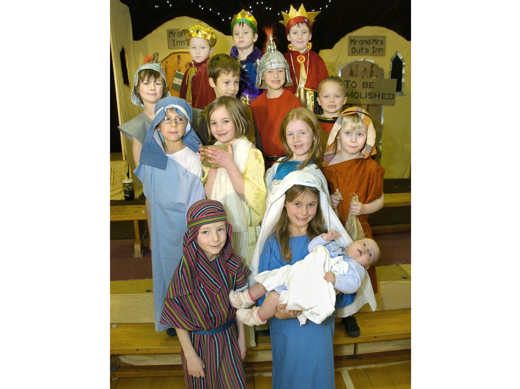 Isaac Hicks as Joseph and Zara Teasdale as Mary, with a live baby Jesus Jemima Clements.