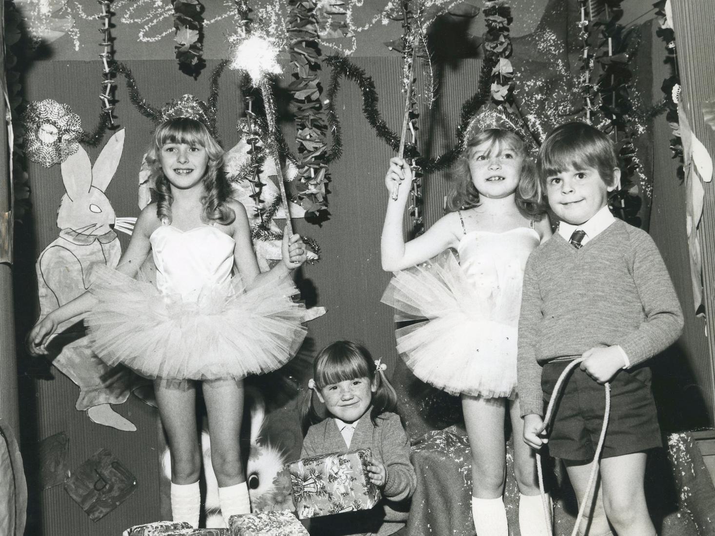 Mandy Simpson and Jason Seddon, both age five, made a visit to Father Christmas grotto at Northfold Infant School, 1976. Santa hadnt arrived but  two fairies, Lucy Boyle (left) and Beth Richardson, were on hand to take Christmas present requests.