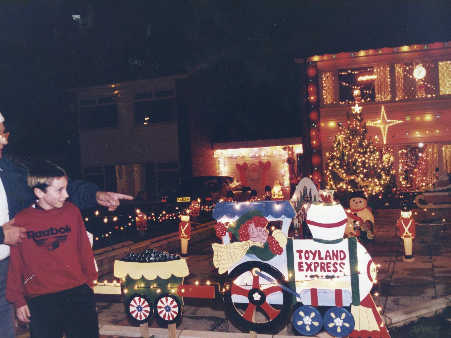 Vernon Dunn, of Seaton Crescent with his outdoor Christmas lights display in 1995