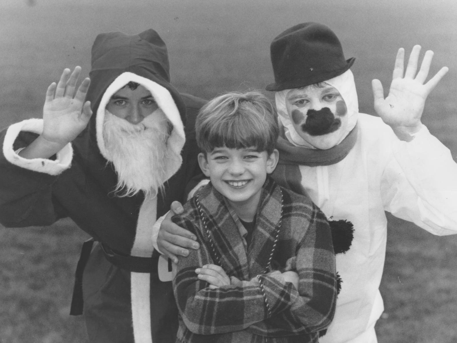 Preparing for their Christmas production of Snowman in December 1997 at Graham School are, left to right, Dale Williamson, Adam Dardouk, and Chris Garrow.