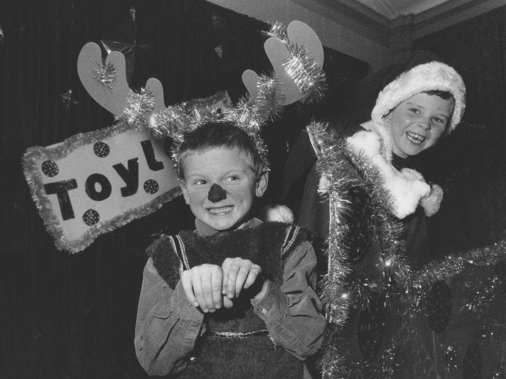 Pupils from Hinderwell School were about to put on their Christmas production in December 1997. Pictured is Santa played by Cameron Jamieson, having a sleigh ride with Rudolph, played by Carl Dickinson.