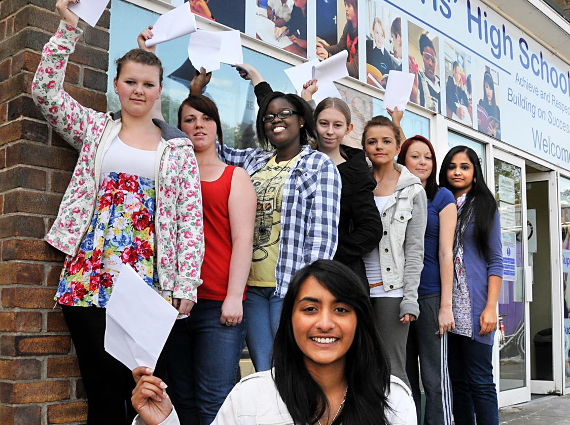 In the foreground is Iesha Mistry. Other A level high achievers are, left to right, Debrah Robinson, Lauren Rowley, Janet Magiga, Jessica Collins, Rachel Peacock, Natasha Brown, and Rabina Khaleeq.