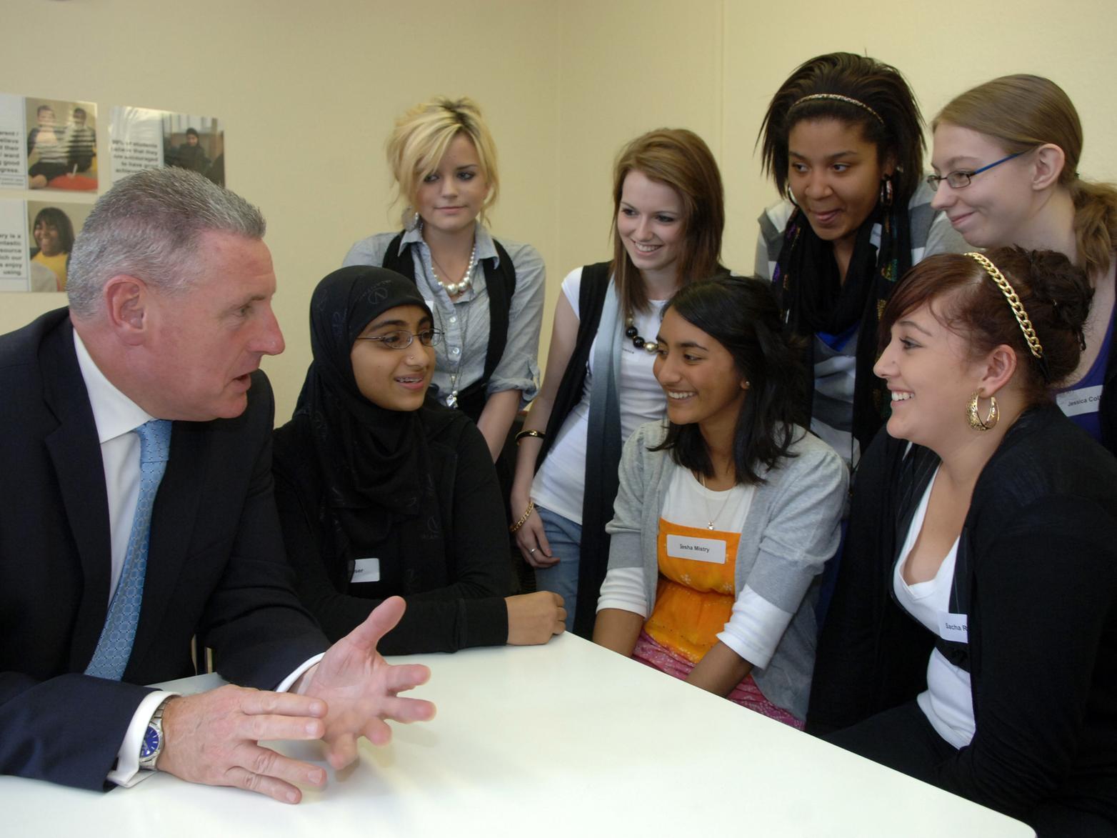 Schools Minister Vernon Coaker with pupils, back from left, Rachel Peacock, Rebecca Lawrence, Stephanie Firth, Jessica Collins, front, Arfana Kauser, Iesha Mistry and Sacha Robinson.