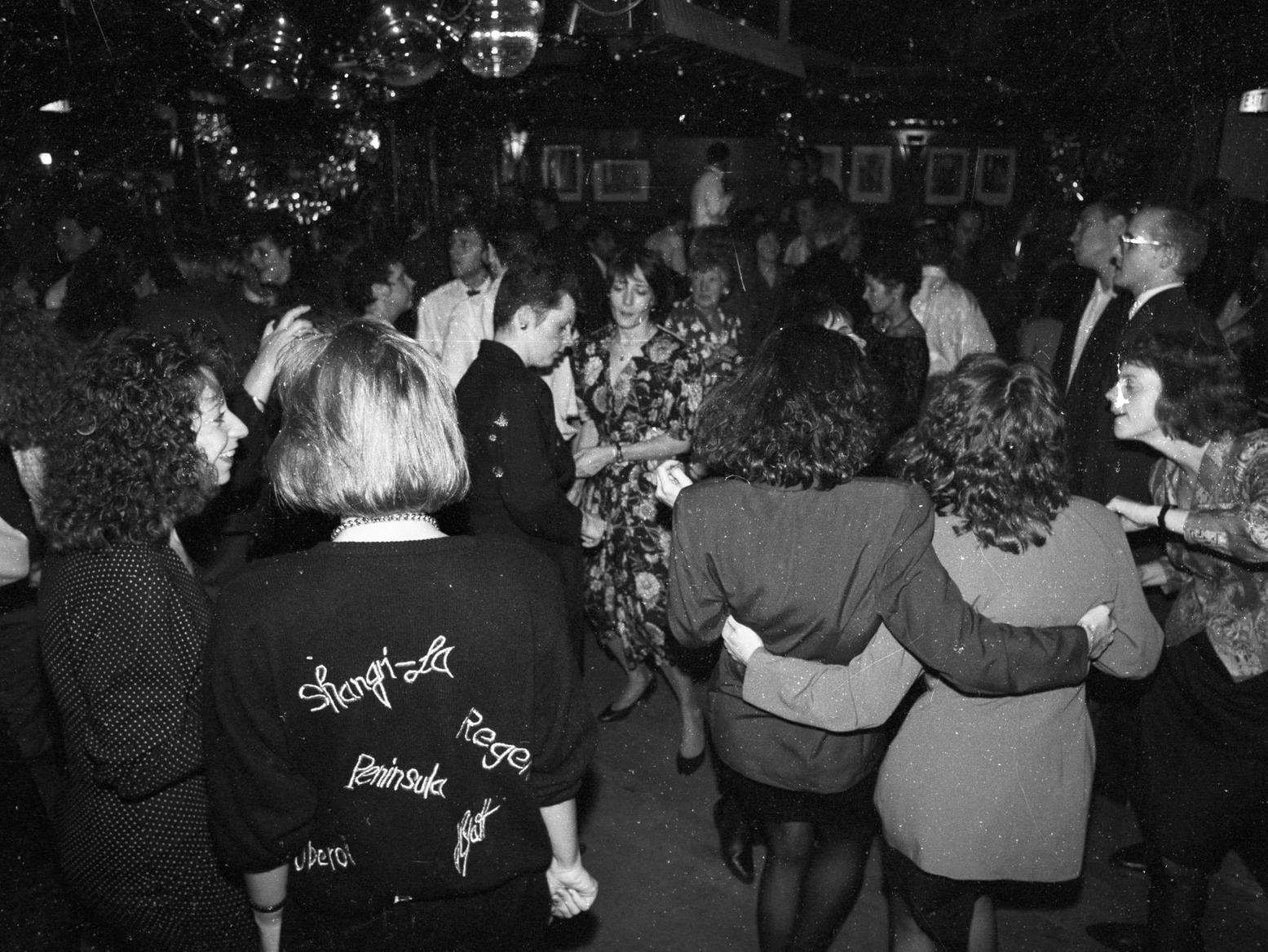 Early 1990s fashions on show in this photo. But in which nightclub was it taken?