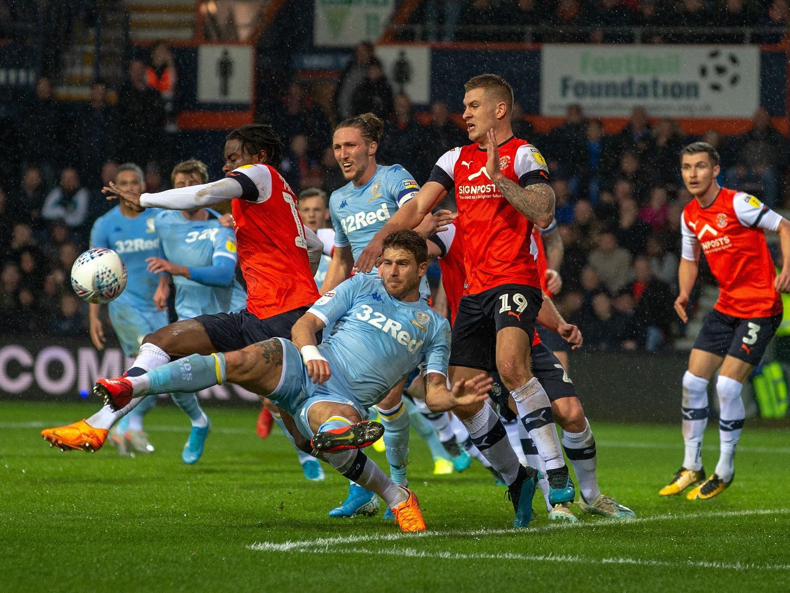 DIGGING IN: Gaetano Berardi helps Leeds United to one of this season's 12 clean sheets in the recent victory at Luton Town. Picture by Bruce Rollinson.