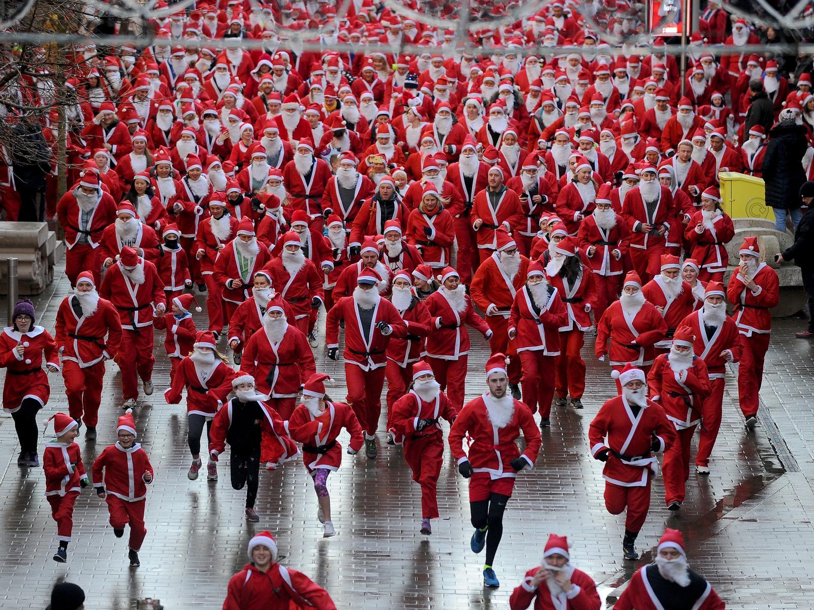 Hundreds of runners took part in the Leeds Santa Dash for St Gemma's Hospice on Sunday. Picture: Simon Hulme