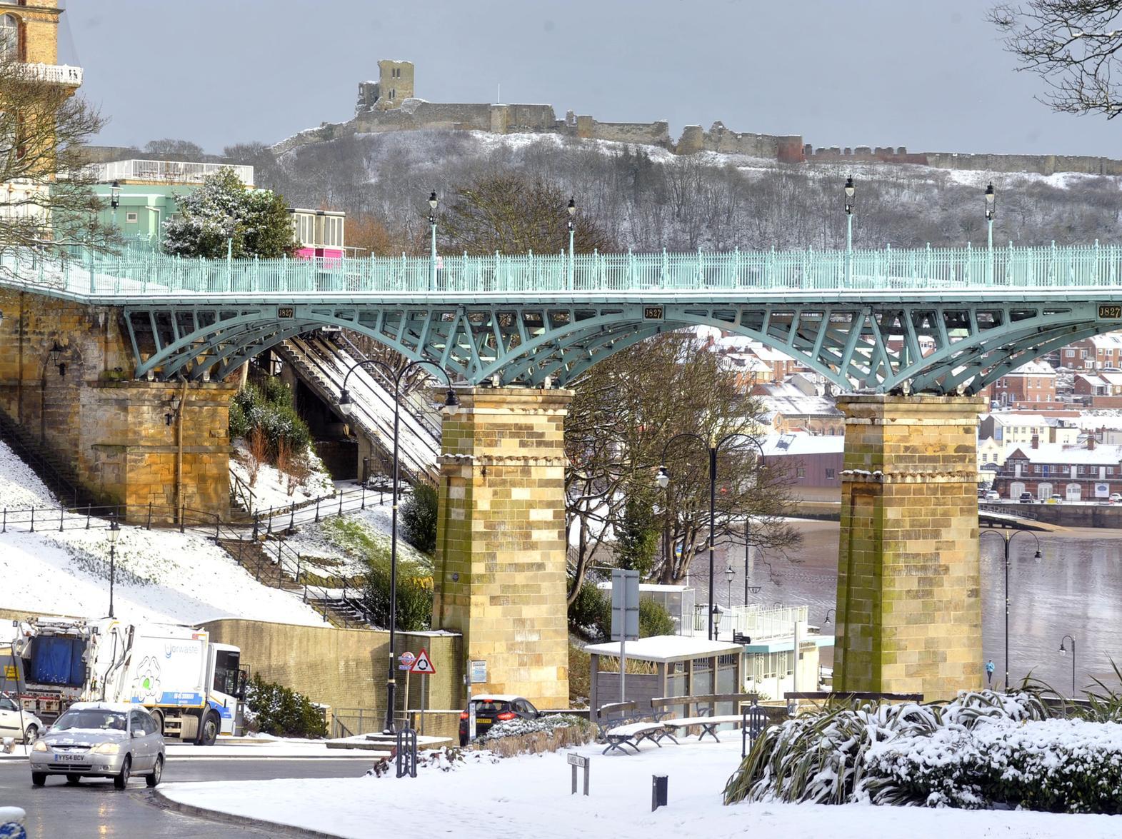 A view of the Spa Bridge and South Bay covered in snow.