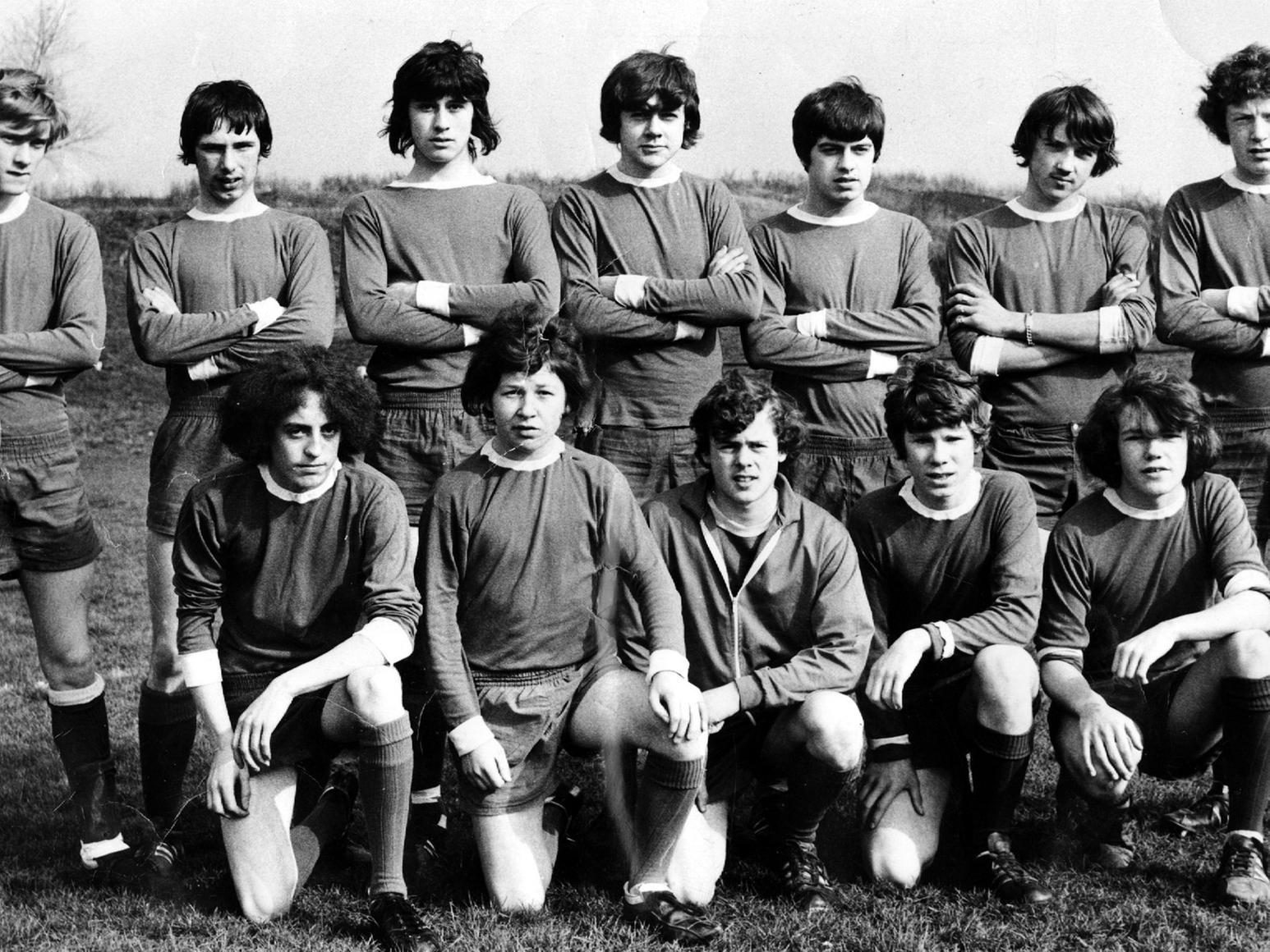 This is St Theresa's football team from the early 1980s when they beat Pudsey Juniors to lift the Leeds and District Minor Cup. They reformed in 1996 to play a charity match for Half and Half.