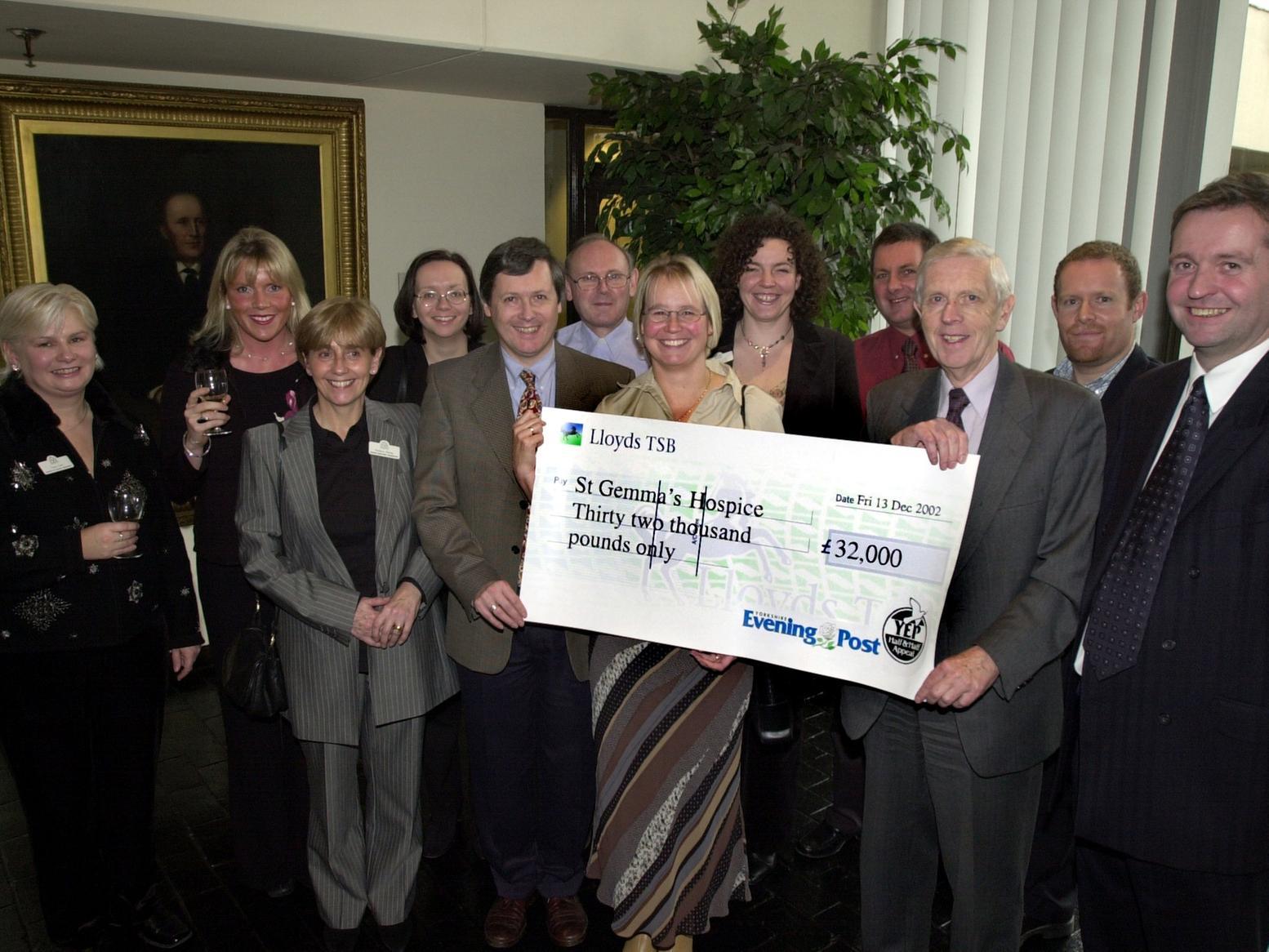 The team from St Gemma's Hospice with YEP editor Neil Hodgkinson anda cheque for their share of the Half and Half.