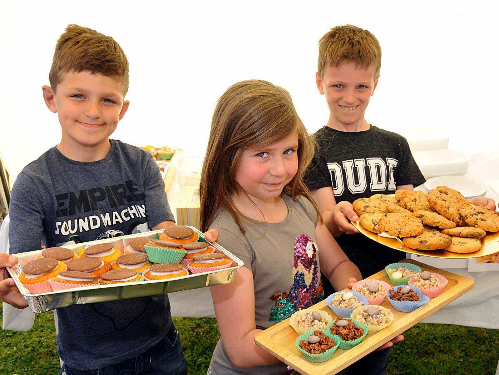 Youngsters from The Oval in Killingbeck held a cake sale and fundraiser for Half and Half. Pictured, from left, Jacob Shaw, Aimee Gardner and Harrison Shaw.
