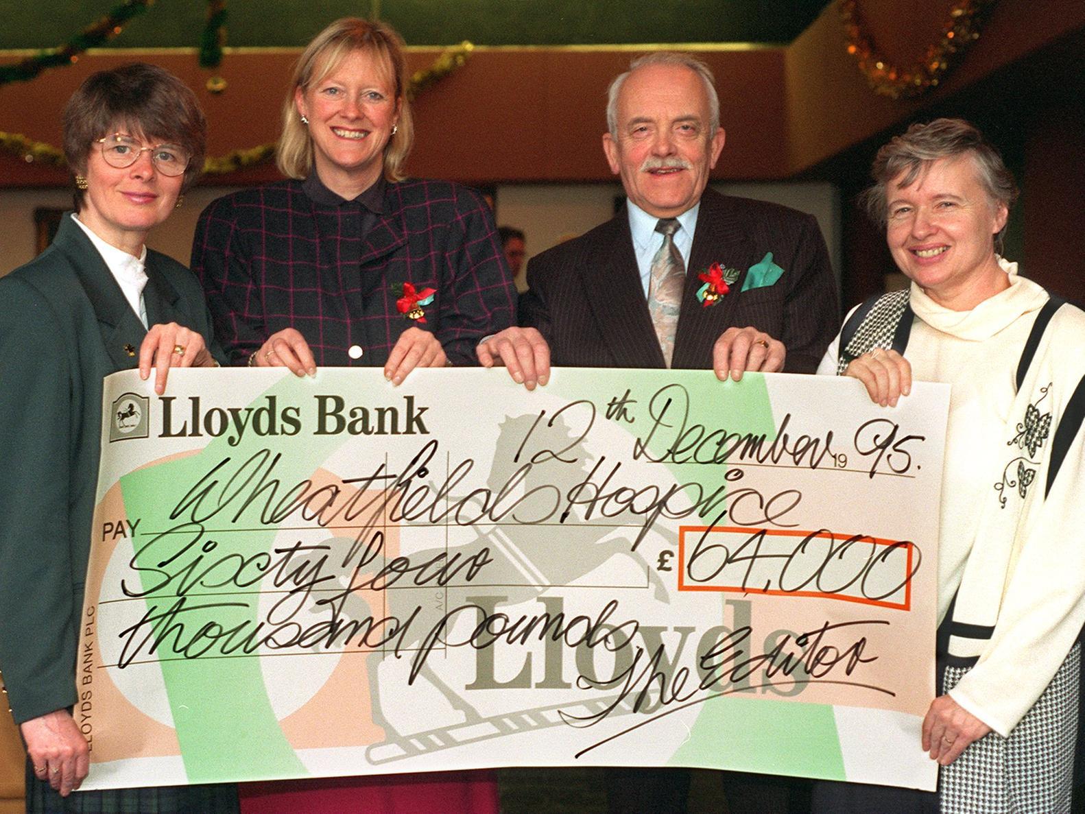 Staff from Wheatfields Hospice with a cheque raised by YEP readers from the Half and Half Appeal. Pictured, from the left, Barbara Barrett, Alyson Wort, Nelson Redman and Pat Riley.