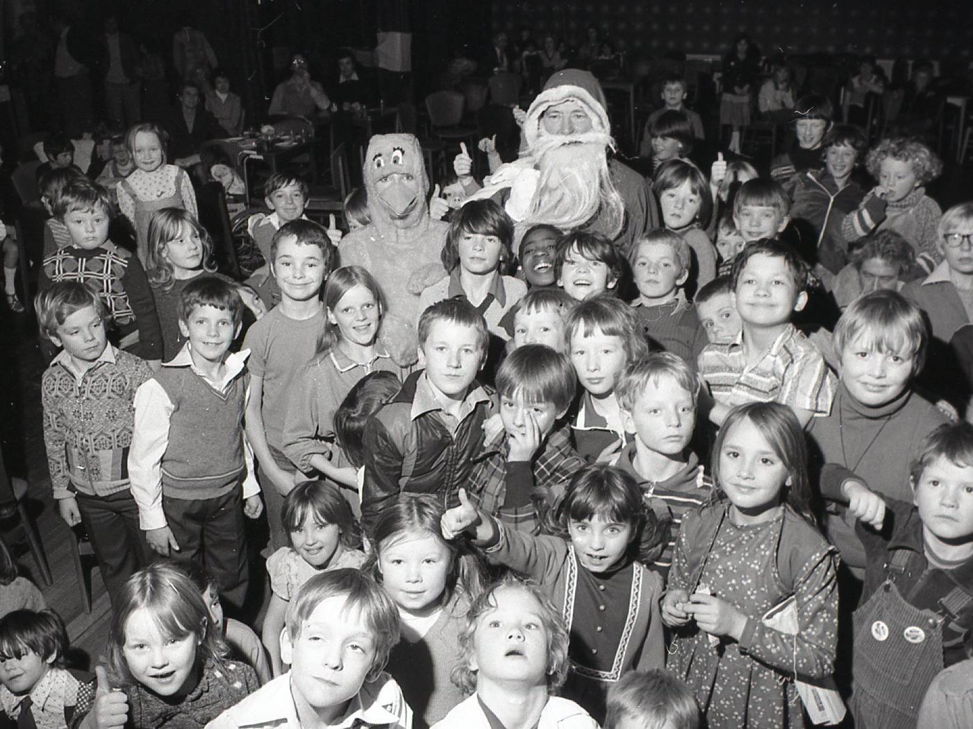 Children and Father Christmas enjoying Preston North End's Christmas party
