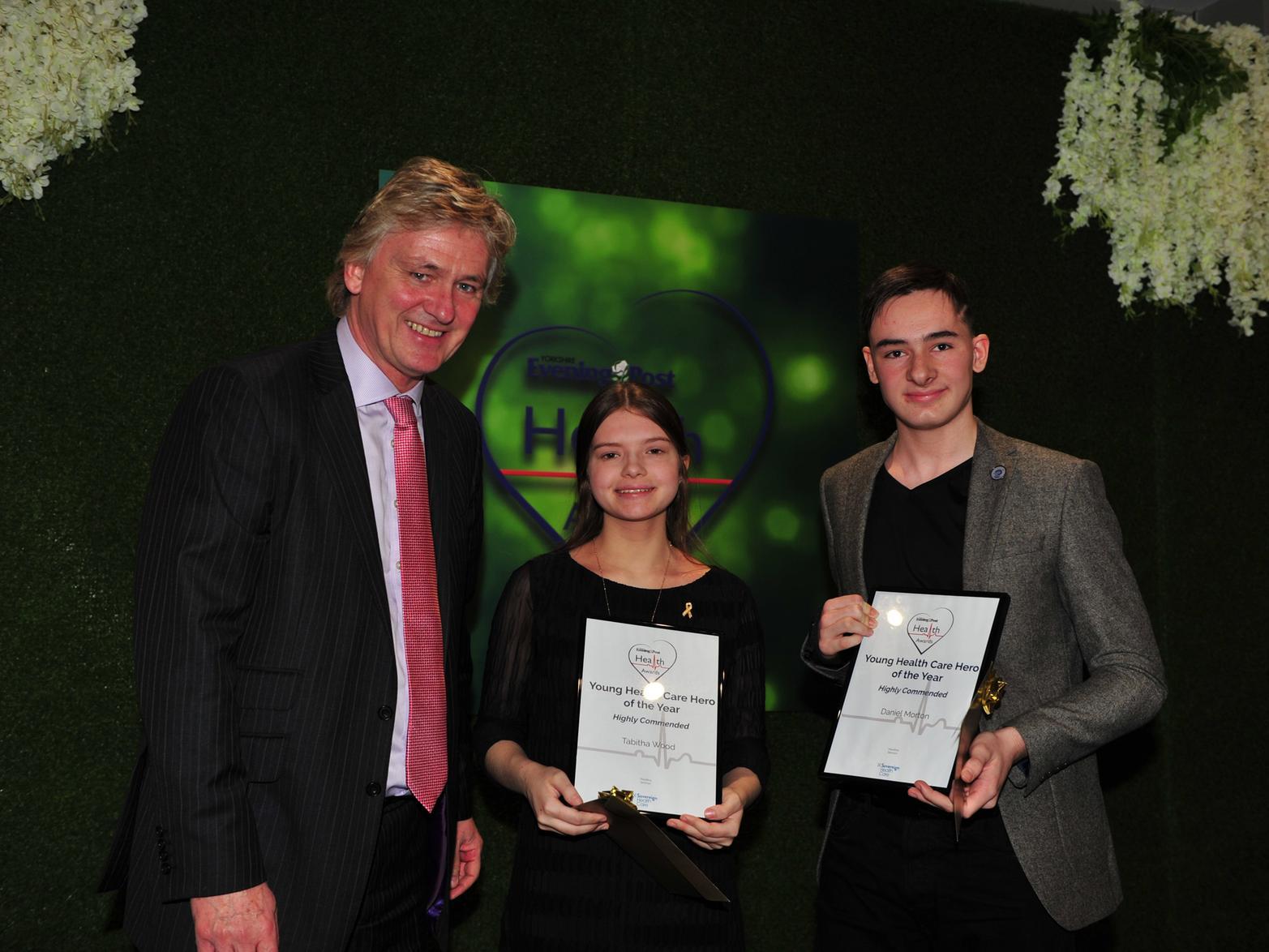 Young Healthcare Heroes: Tabitha Wood and Daniel Morton, who were highly commended in the YEP Health Awards 2019, with their certificates, which were presented by Russ Piper, chief executive of main health awards sponsor Sovereign Health Care.