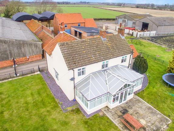 This property comprises an agricultural smallholding with substantial house. Included in the property is 25,000sqft of agricultural buildings of brick and steel framed construction. Guide price 2,100,000 GBP
