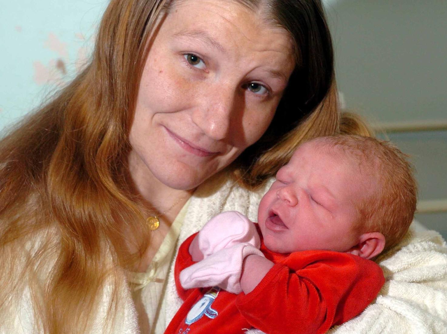 Xania Richardson with her 2009 Christmas Day baby, Adanna, at Leeds General Infirmary.