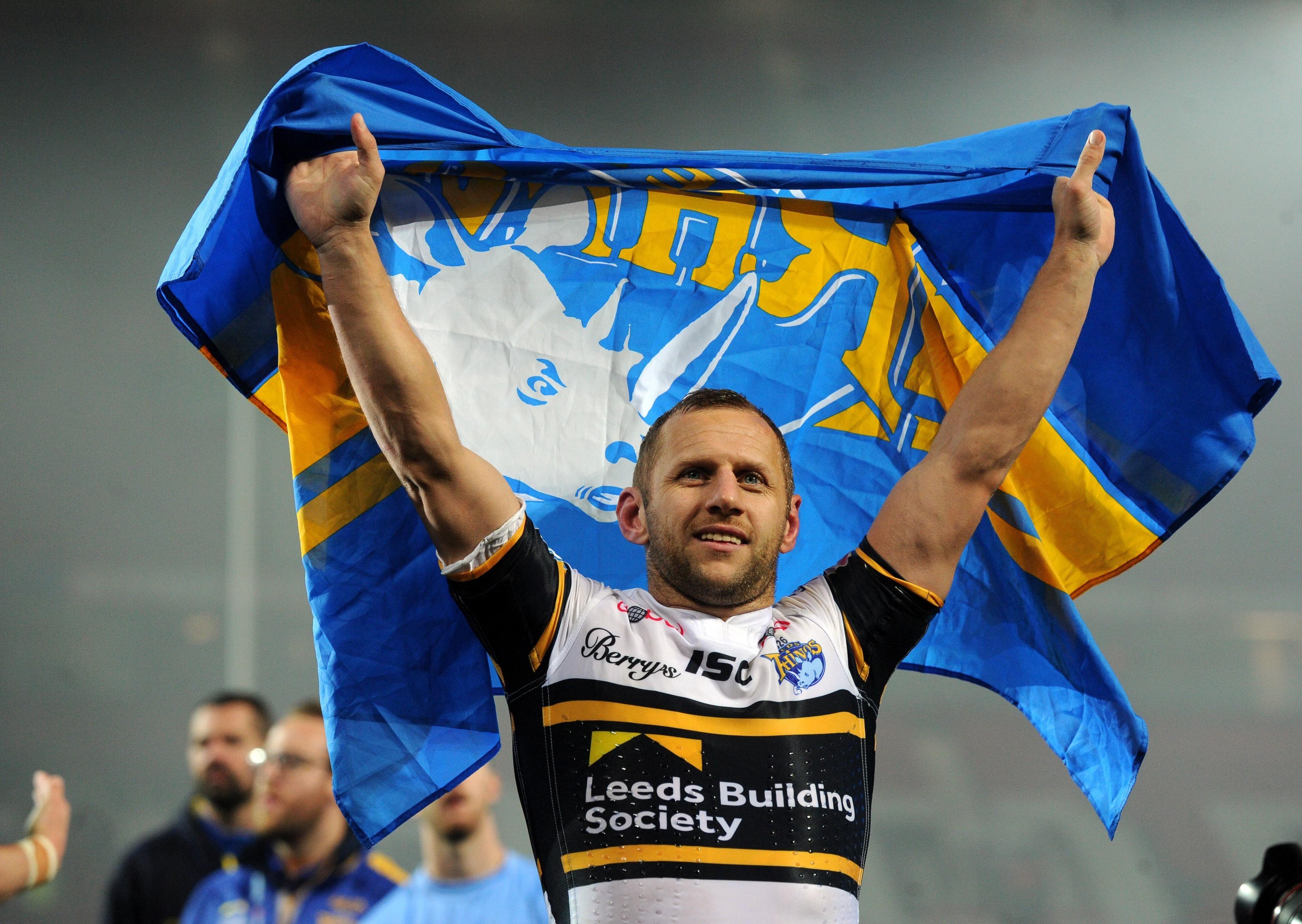 Rob Burrow salutes the Rhinos fans after the 2017 Grand Final win over Castleford Tigers.