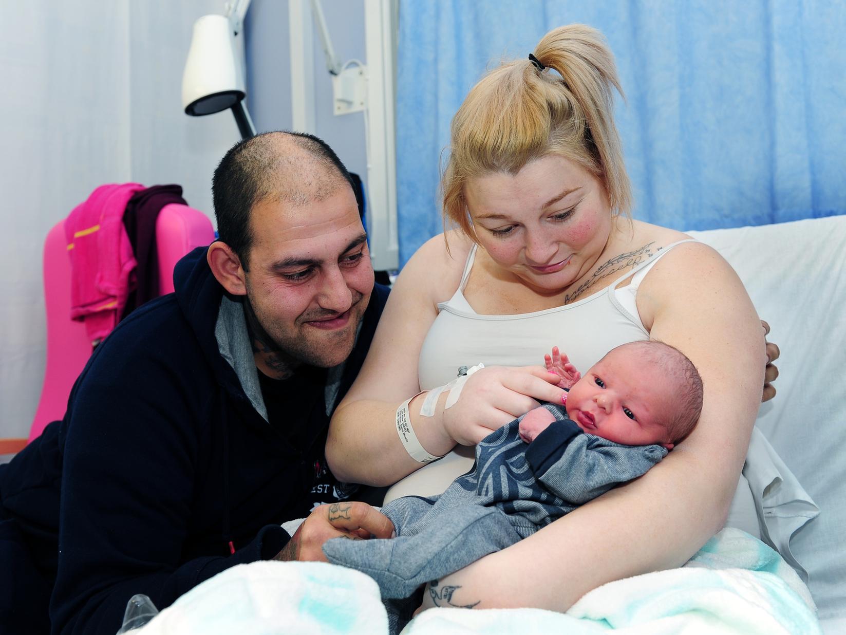 Sophie Graves and Ashley Bradley from Belle Isle with their son Vinny Jay, who was born at midnight at St. James's Hospital, weighing 6lb 6oz.